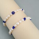 PULSERA OJITOS PERLAS