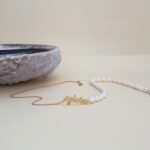 COLLAR UN NOMBRE HALF BARBADA